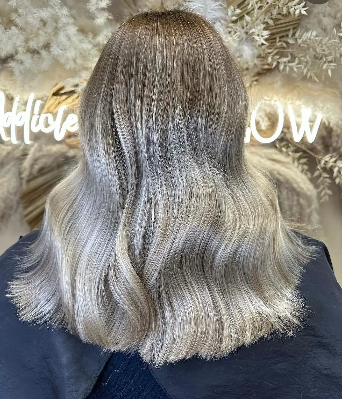 Blonde long bob with a smooth balayage finish